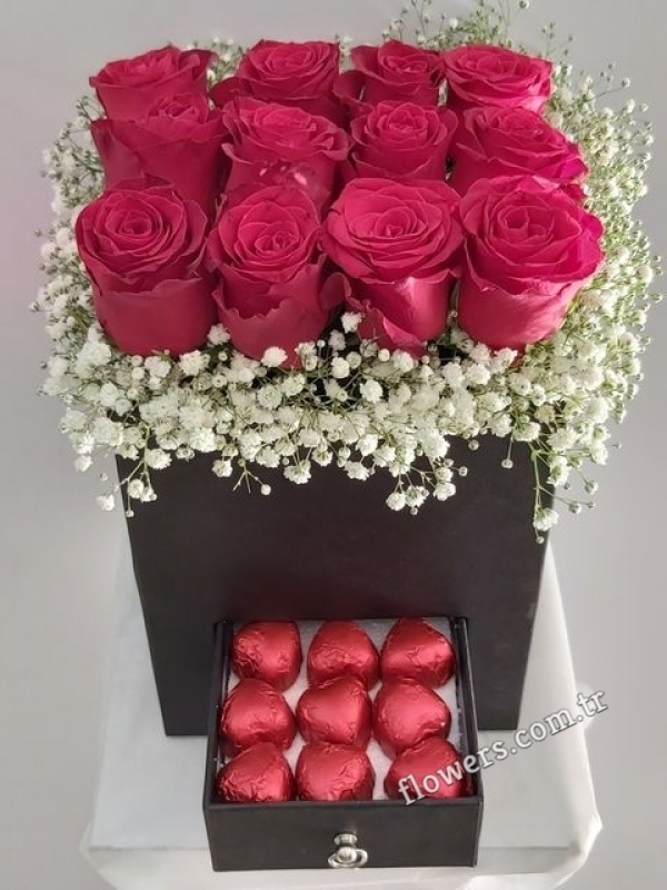 Red Roses And Heart-shaped Chocolates